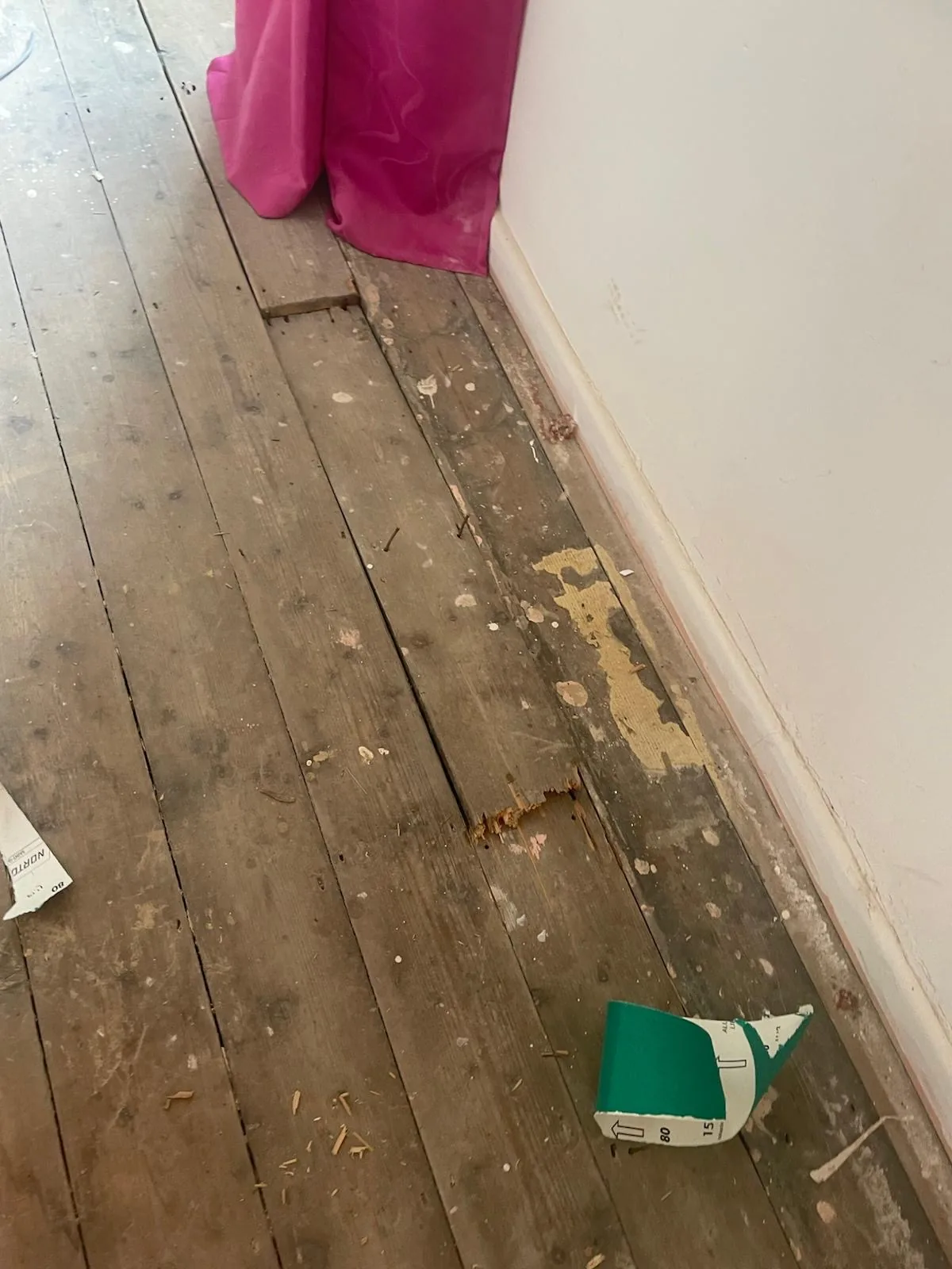 Damaged floor before repair