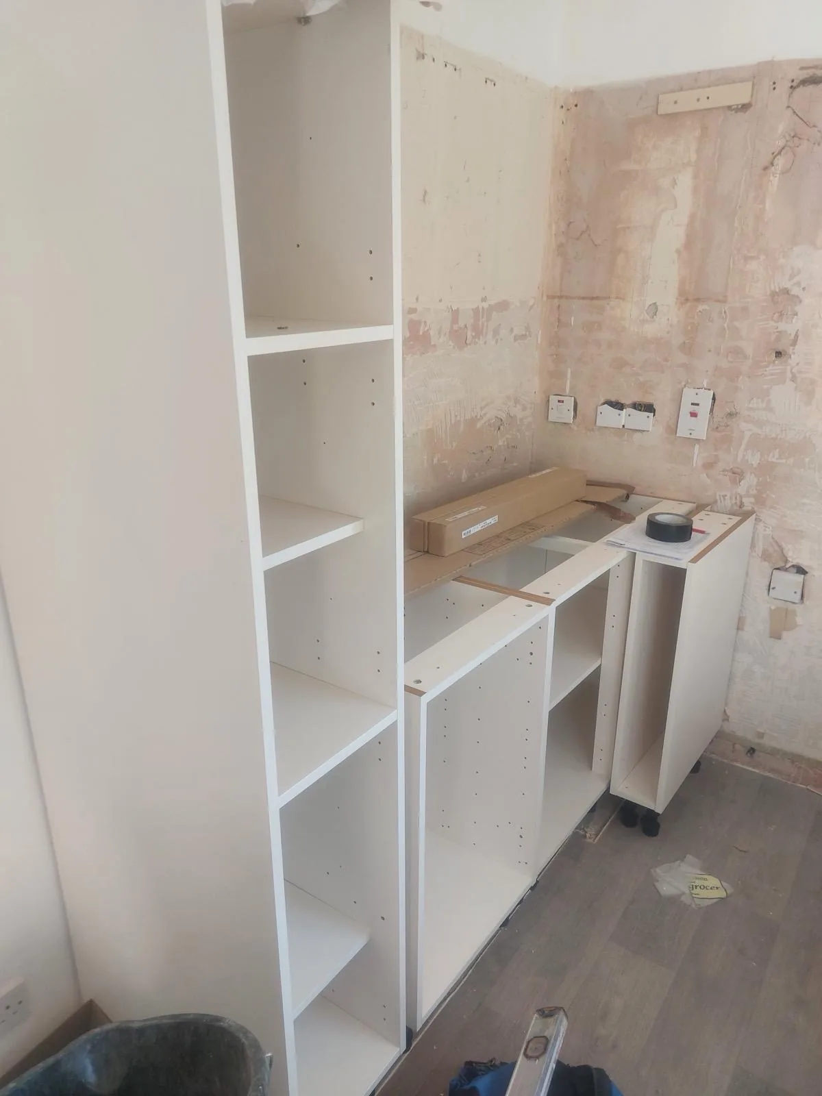 Kitchen units being fitted